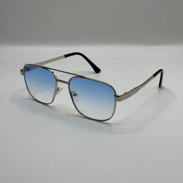 Sunglasses with gradient blue lenses on a light gray background